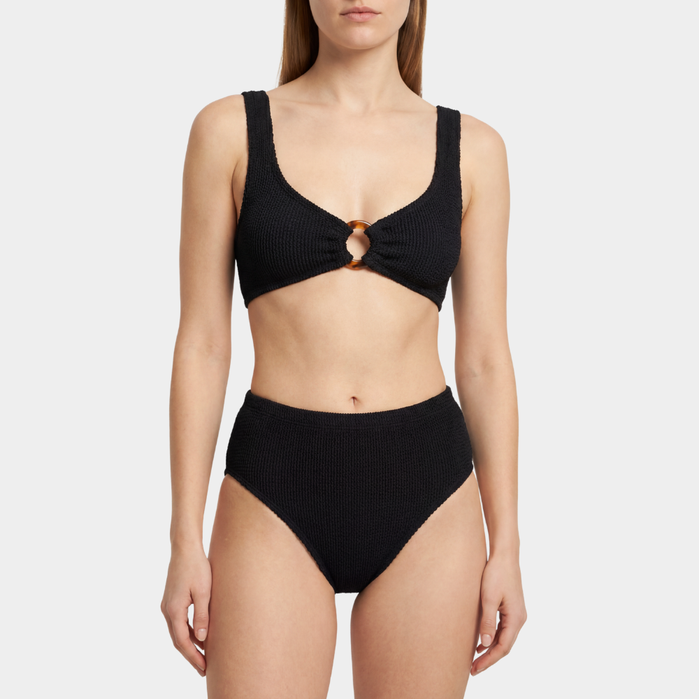 Front view of the Portofino bikini with tortoise shell hoop and high waisted bottoms in midnight black