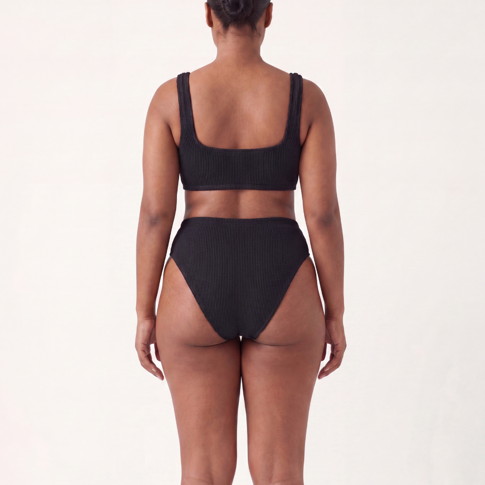 Back view of the Amalfi bikini with high waisted bottoms in midnight black