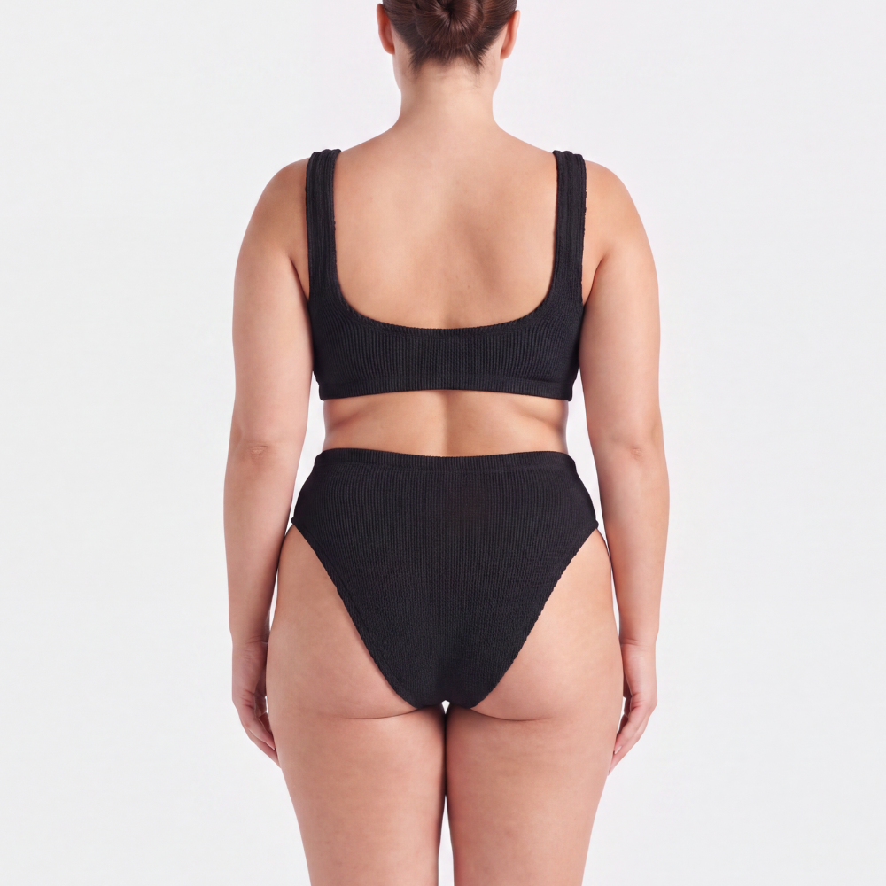 Back view of the Amalfi bikini with high waisted bottoms in midnight black